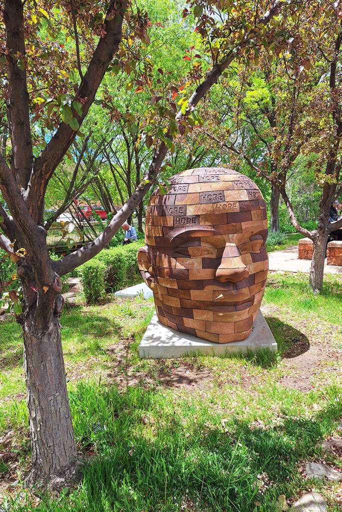 Wooden face sculpture in Santa Fe, USA